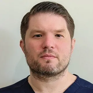 Andrew C Retzinger